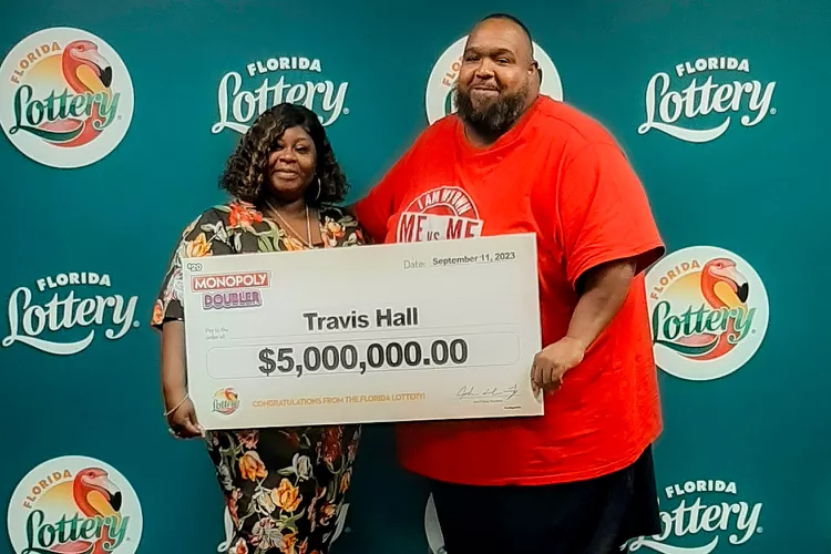 Travis Hall (right) and his wife Nicole Hall. PHOTO: COURTESY OF FLORIDA LOTTERY